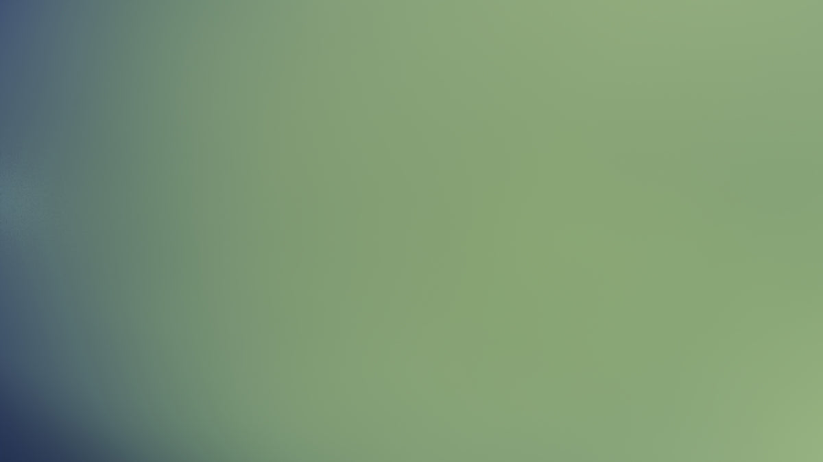 The image shows a blurry, greenish-blue gradient.